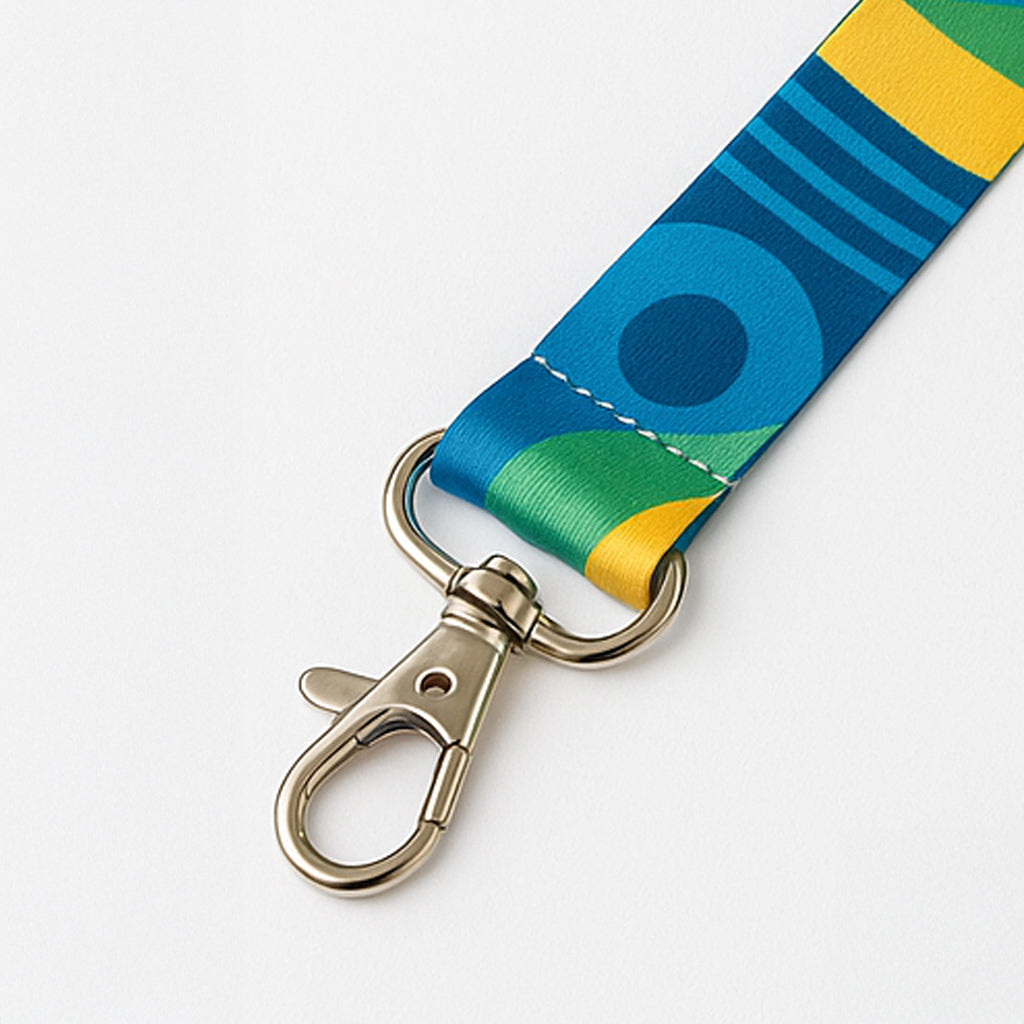 Colorful ribbon keychain with a metal clasp on a white background