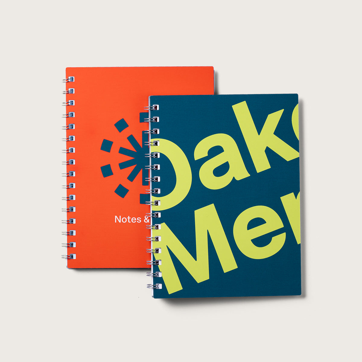 Two A6 branded notebooks, with custom aluminium covers, printed in full colour.